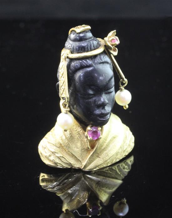 A 20th century 18ct gold, ruby, carved obsidian? and cultured pearl brooch modelled as the bust of an oriental gentleman, 1.25in.